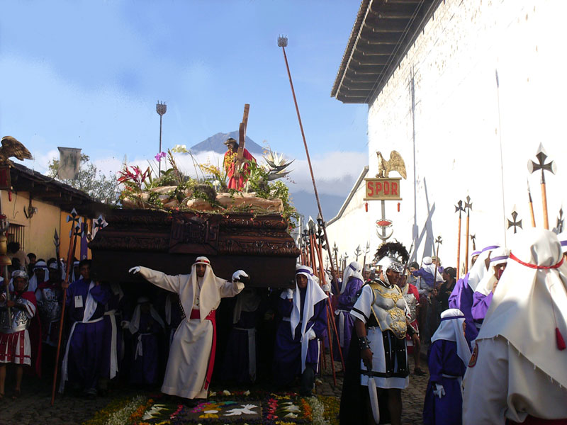 This is an "anda", an Easter procession float,carried by 80 men, on Good Friday morning ... click for a larger image.