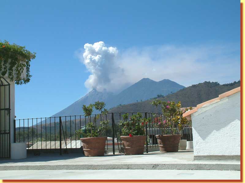 Fuego on the left and Acotenango on the right, from our roof