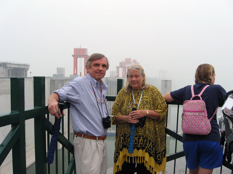 On top of the Three Gorgges Dam, but we can't see much in the mist, damn!  ... Click to see a large image