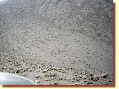 Pacaya volcano in November 2004 ... lava was not flowing and, in the same field, people used lava rocks to write their own names and messages