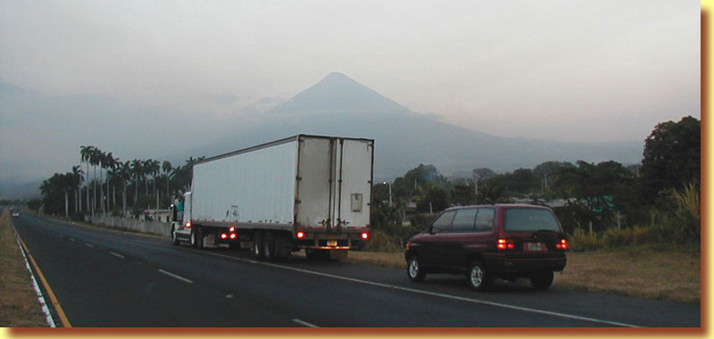 ... lovely weather and beautiful Guatemala scenery, almost home in Antigua ... the highway from Escuintla to Guatemala City.  Antigua is just the other side of Volcano Agua.